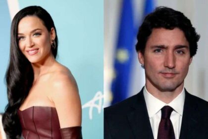 फ्रांस में यॉट पर कैटी पेरी और जस्टिन ट्रूडो का किस करते हुए दृश्य, समुद्र की पृष्ठभूमि में।