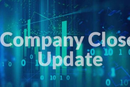 Stock market screen showing Sensex & Nifty movements, traders working in exchange