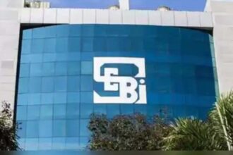 “Stock market trading floor with Sensex and Nifty indices showing gains”