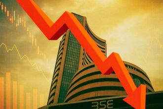 शेयर बाजार गिरावट के दौरान Sensex और Nifty लाल निशान में ट्रेड करते हुए