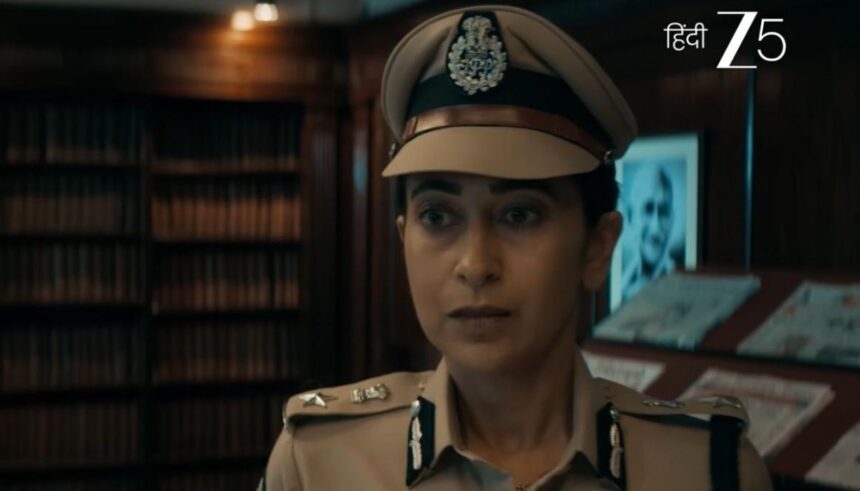 ब्राउन ट्रेलर में करिश्मा कपूर पुलिस अफसर रीटा ब्राउन के रूप में मर्डर मिस्ट्री की जांच करती हुई।
